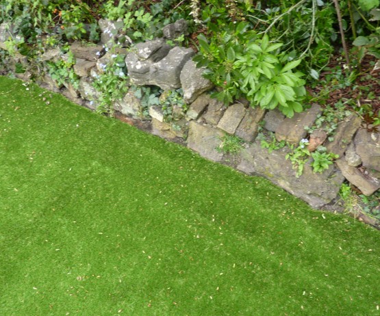Artificial grass for playgrounds