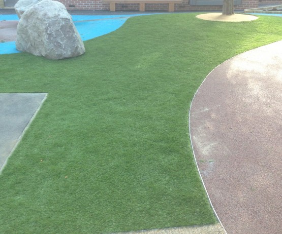 Artificial grass for playgrounds