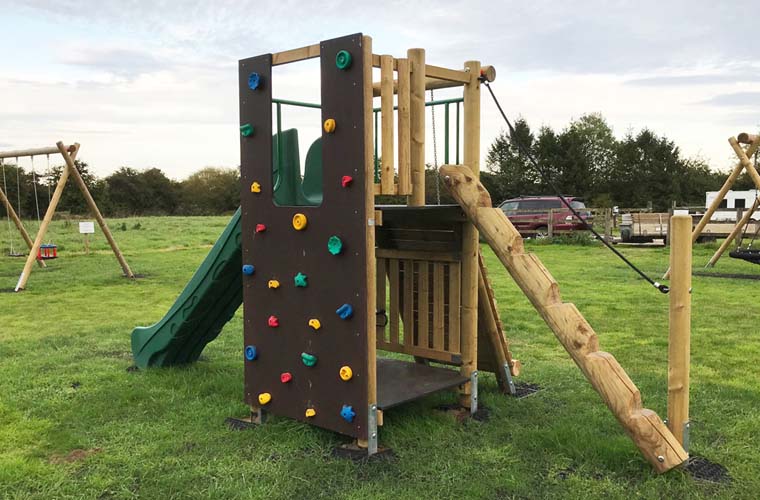 Activity tower showing the Climbing Wall and Jungle Ladder